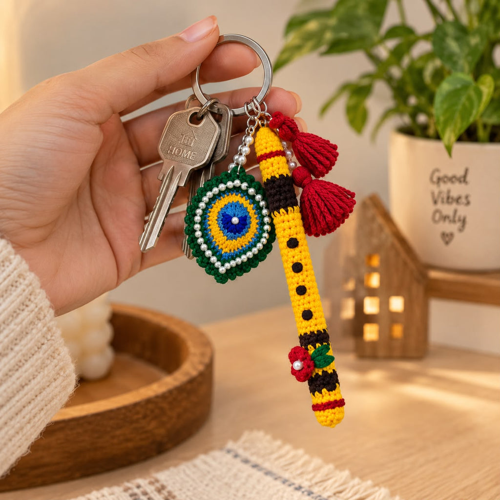 Handmade Crochet Flute and Peacock Feather Keychain Set with Pearl Embellishments