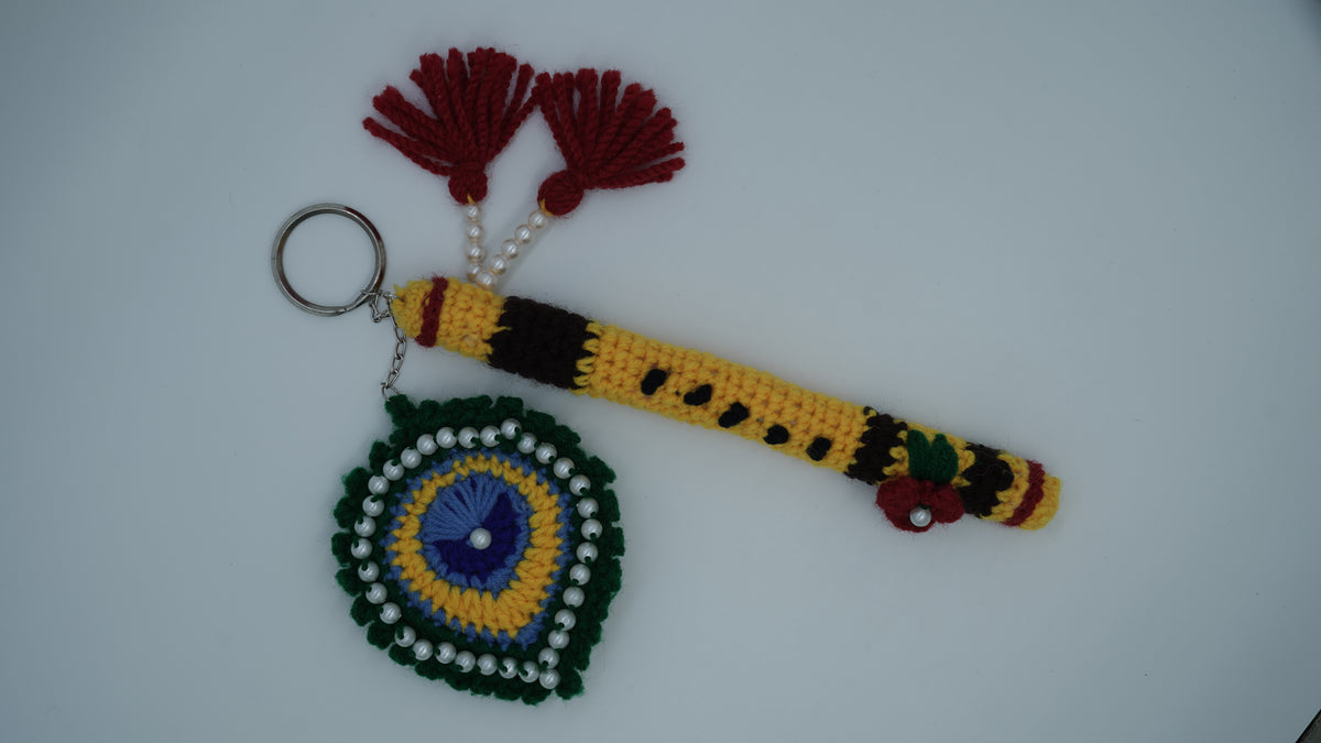 Handmade Crochet Flute and Peacock Feather Keychain Set with Pearl Embellishments