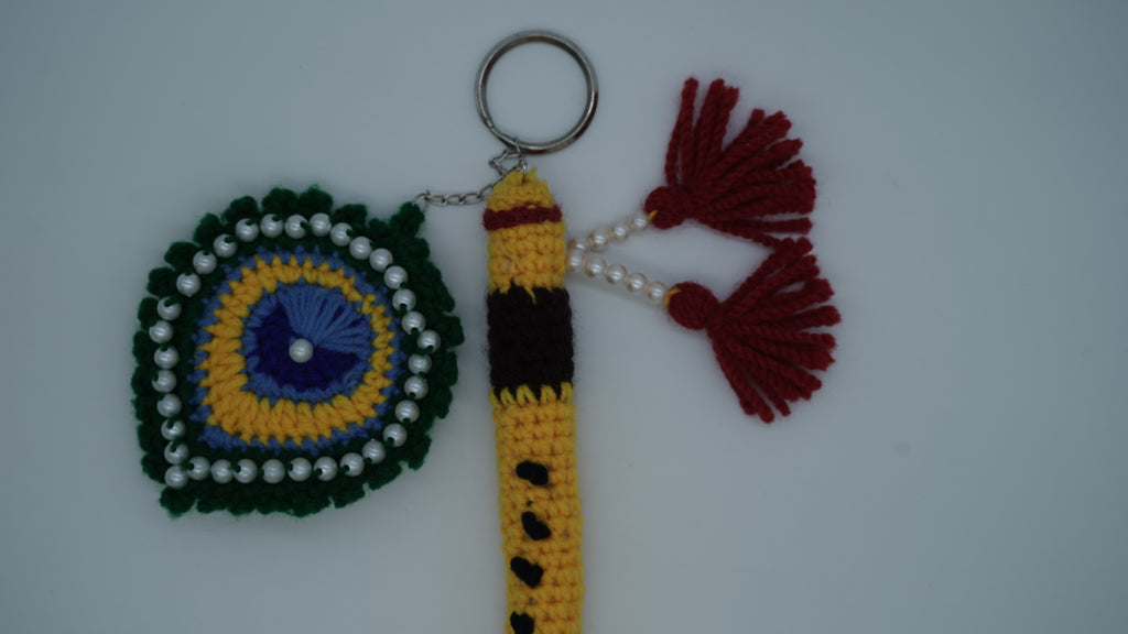 Handmade Crochet Flute and Peacock Feather Keychain Set with Pearl Embellishments