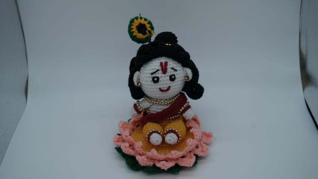 Handmade Crochet Laddu Gopal Ji Idol with Decorative Beads and Lotus Base