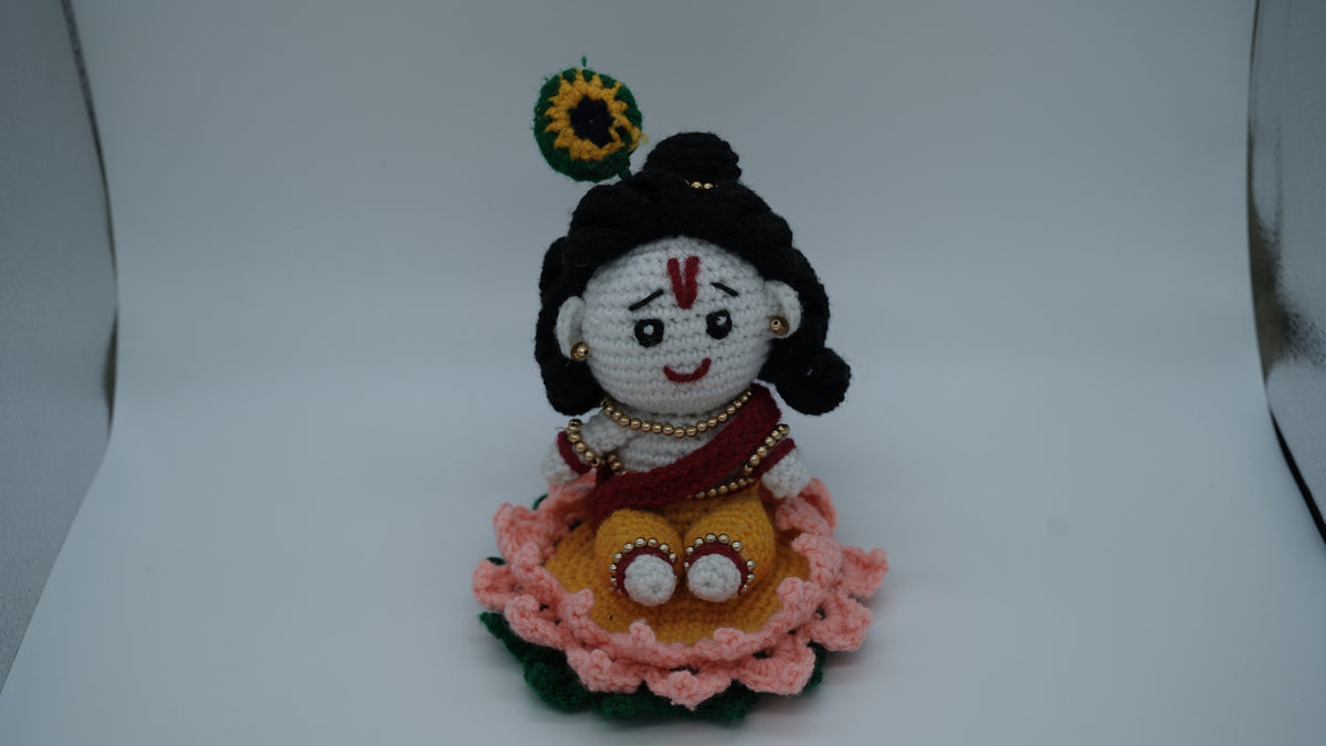 Handmade Crochet Laddu Gopal Ji Idol with Decorative Beads and Lotus Base