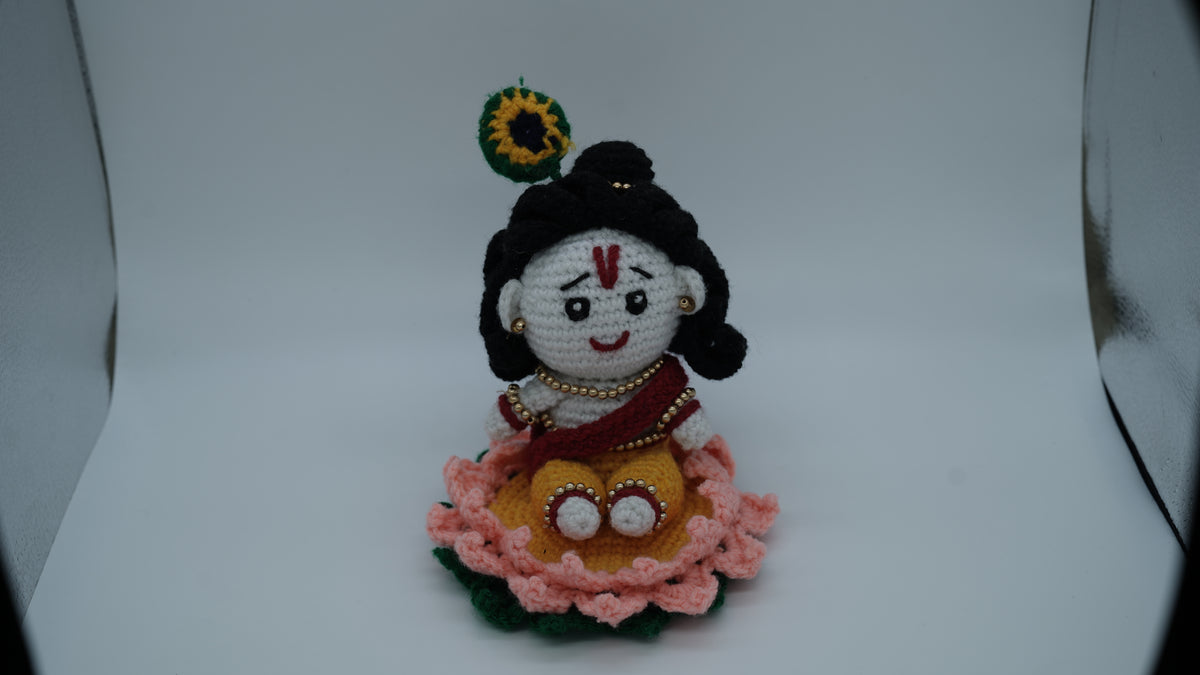 Handmade Crochet Laddu Gopal Ji Idol with Decorative Beads and Lotus Base