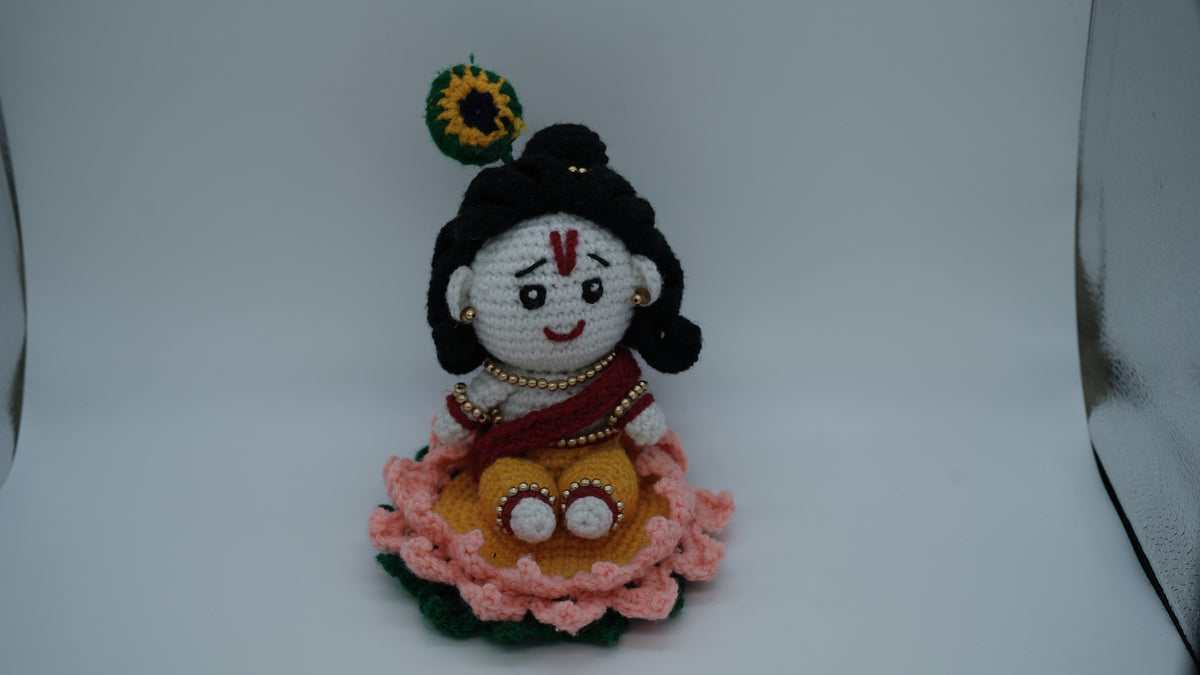 Handmade Crochet Laddu Gopal Ji Idol with Decorative Beads and Lotus Base