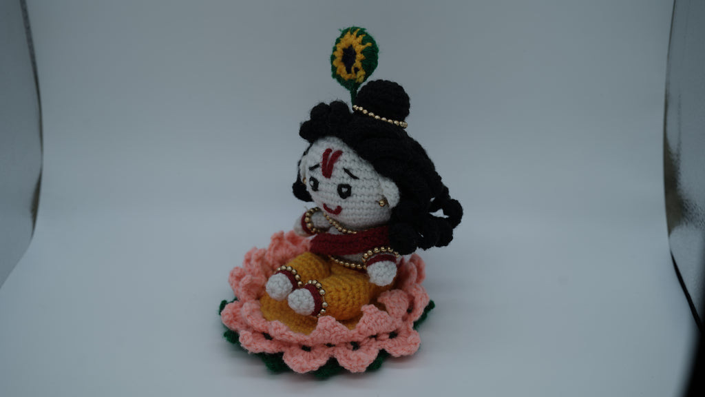Handmade Crochet Laddu Gopal Ji Idol with Decorative Beads and Lotus Base
