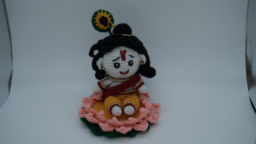 Handmade Crochet Laddu Gopal Ji Idol with Decorative Beads and Lotus Base
