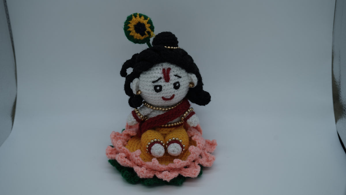 Handmade Crochet Laddu Gopal Ji Idol with Decorative Beads and Lotus Base