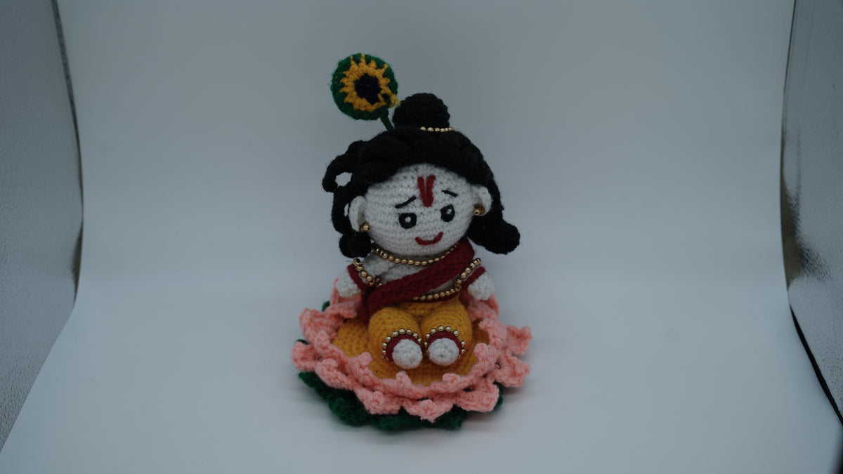 Handmade Crochet Laddu Gopal Ji Idol with Decorative Beads and Lotus Base