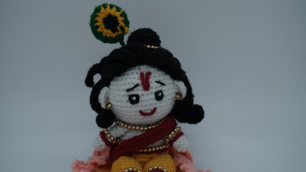 Handmade Crochet Laddu Gopal Ji Idol with Decorative Beads and Lotus Base