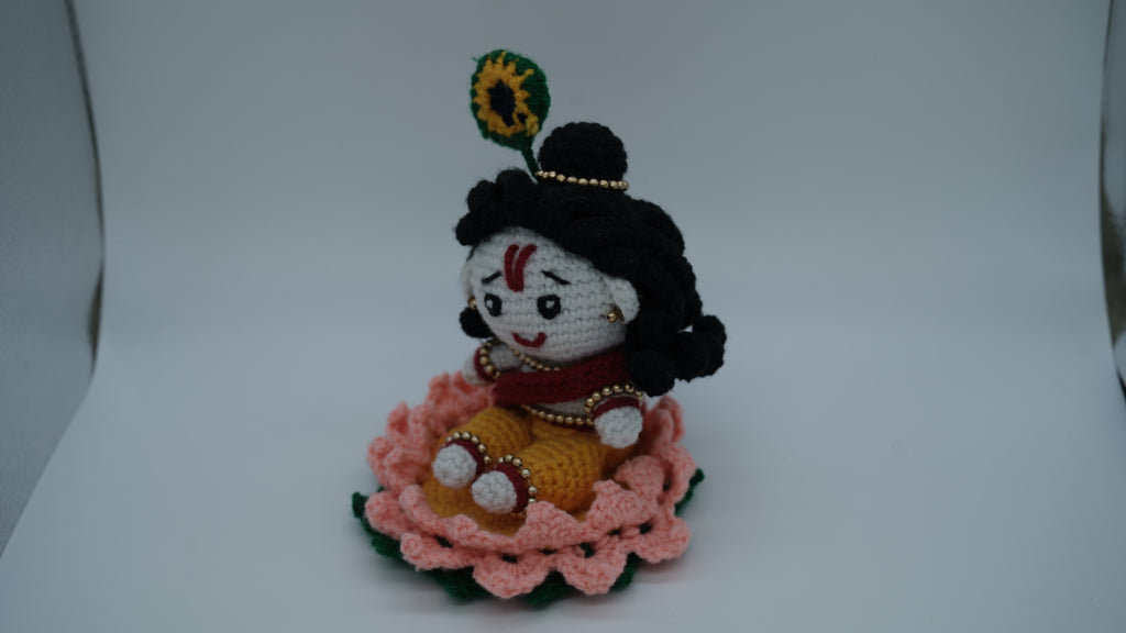 Handmade Crochet Laddu Gopal Ji Idol with Decorative Beads and Lotus Base