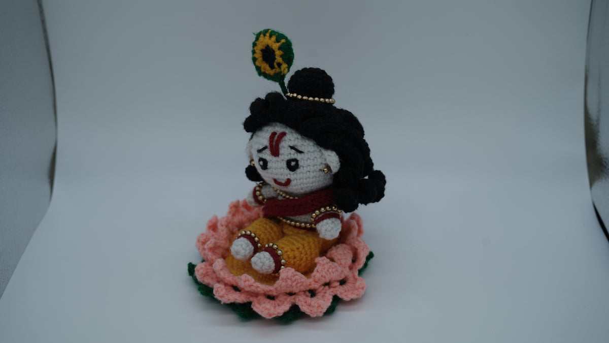 Handmade Crochet Laddu Gopal Ji Idol with Decorative Beads and Lotus Base