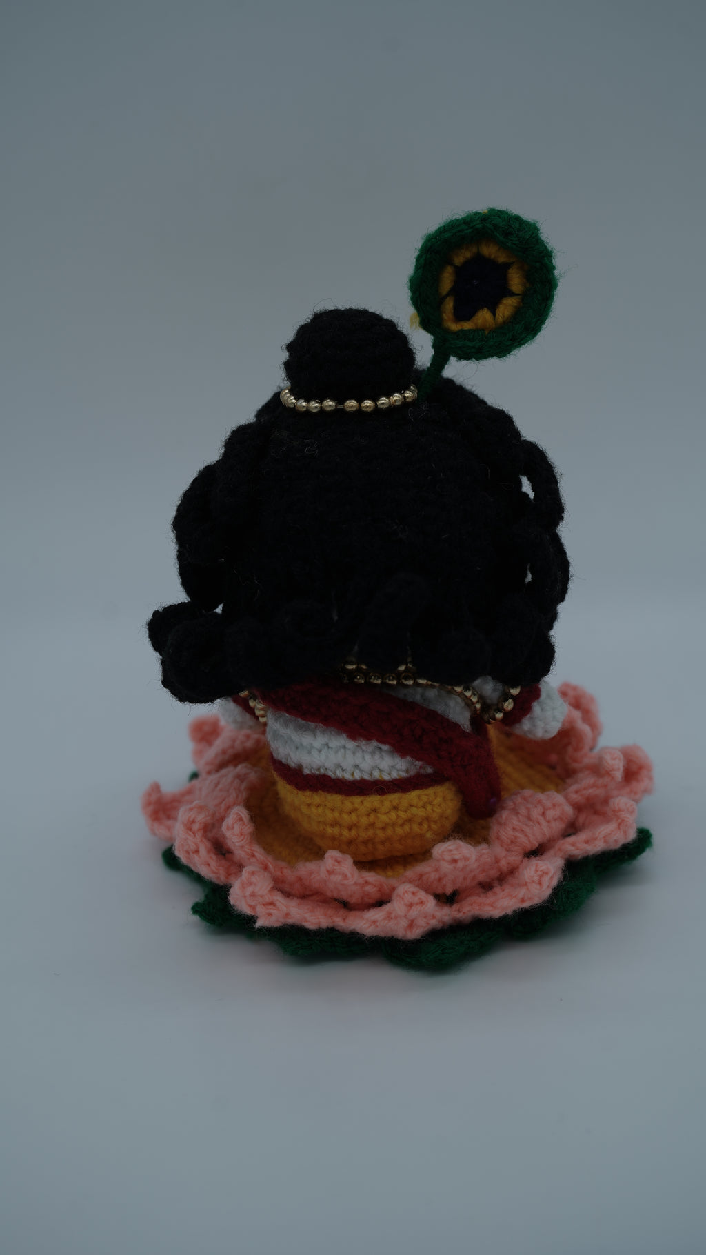Handmade Crochet Laddu Gopal Ji Idol with Decorative Beads and Lotus Base